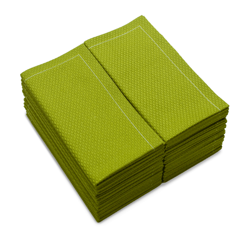 Stack of Pear organic cotton hand towels with visible textured weave and folded edges