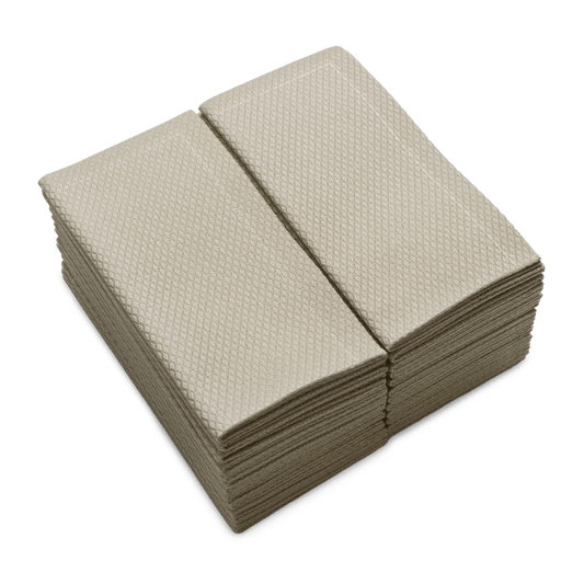Stack of folded Sand organic cotton hand towels with textured pattern