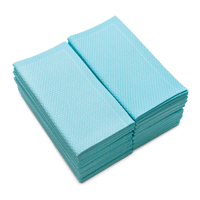 Stack of SeaGlass organic cotton hand towels, folded, with textured pattern