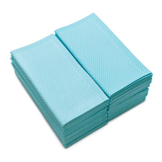 Stack of SeaGlass organic cotton hand towels, folded, with textured pattern