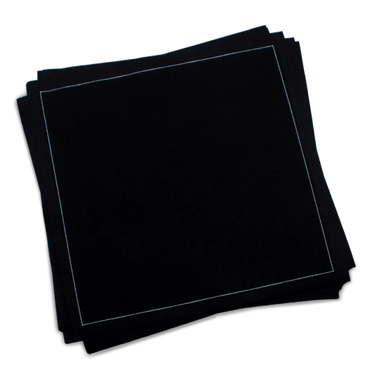 Stack of black organic cotton luncheon napkins, by Five Star Napkins.