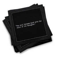 Organic cotton cocktail napkin, black, with white dotted border printed with the quote "The soul becomes dyed with the color of its thoughts," from Five Star Napkins' Marcus Aurelius quote collection
