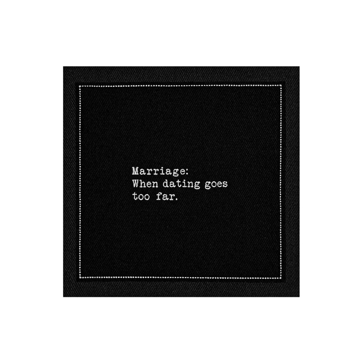 Black marriage quote cocktail napkin with white typewriter-style text reading, “Marriage: When dating goes too far.”