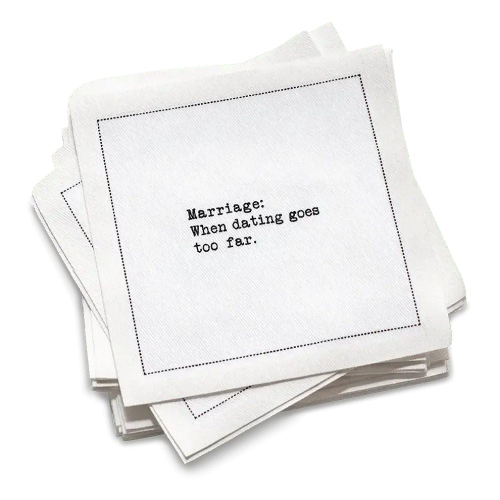 Stack of white marriage quote cocktail napkins with black typewriter-style text reading, “Being married is like having a best friend who doesn’t remember anything you say.”