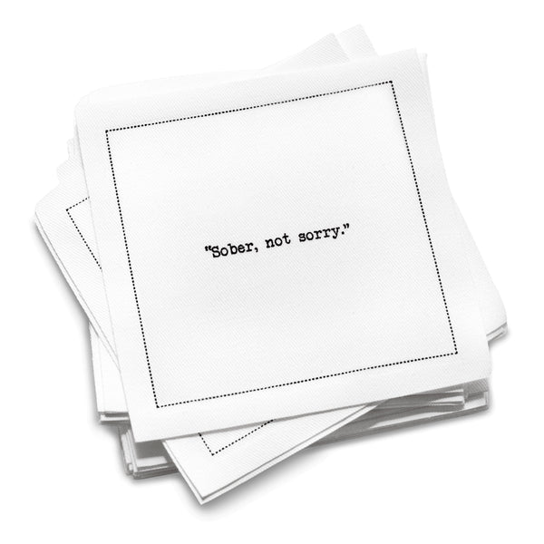 Organic cotton cocktail napkin with black dotted border printed with the quote "Sober, not sorry," from Five Star Napkins' Mocktail quote collection