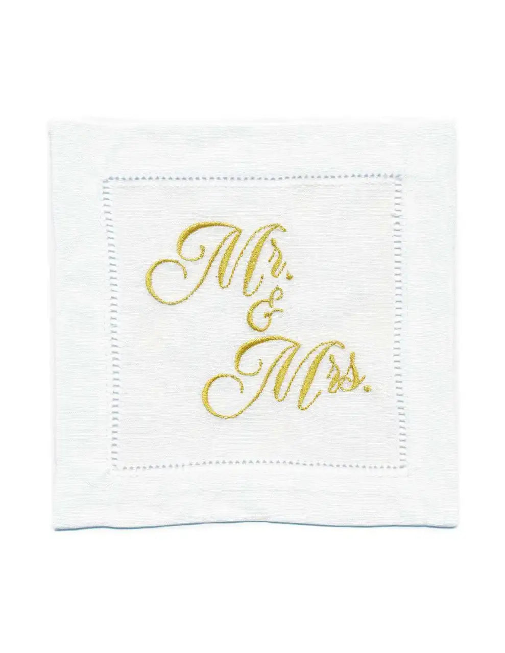 Organic cotton cocktail napkin with hemstitched border, embroidered with “Mr. & Mrs.” in gold script, by Five Star Napkins.