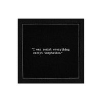Organic cotton cocktail napkin, black, with white dotted border printed with the quote "I can resist everything except temptation," from Five Star Napkins' Oscar Wilde quote collection