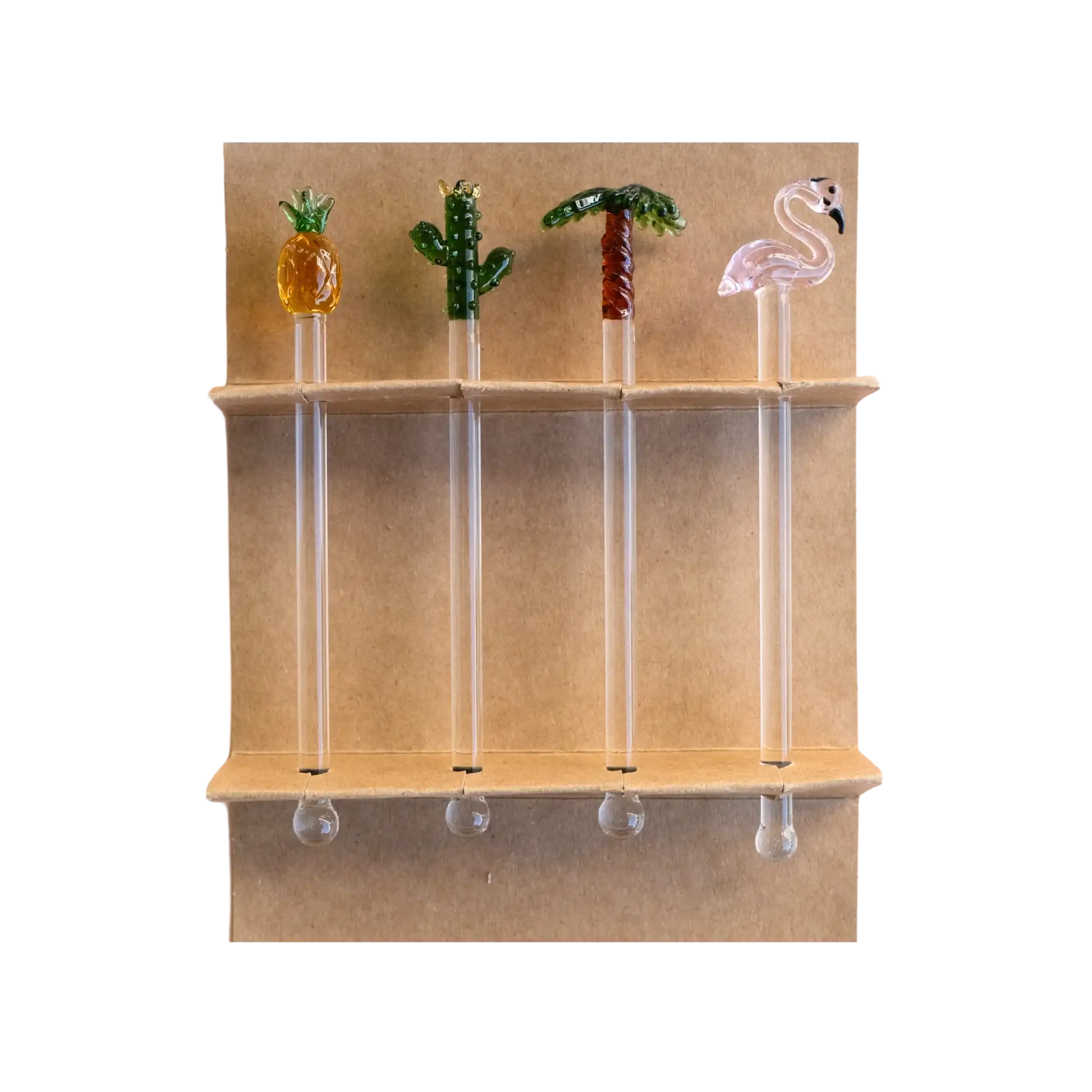 Four glass swizzle sticks — pineapple, cactus, palm tree, and flamingo — displayed in their kraft gift box, by Five Star Napkins.