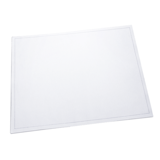 White luxury cotton placemat with stitched border on plain background