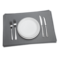 Luxury grey organic cotton placemat set with white plate and silver cutlery