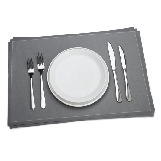 Luxury grey organic cotton placemat set with white plate and silver cutlery