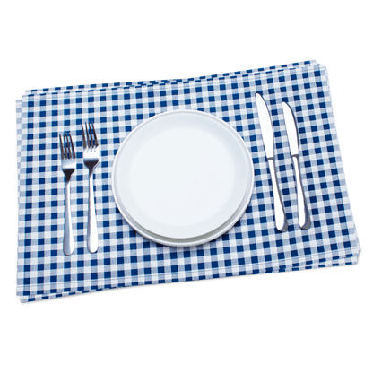 Navy blue and white checkered cotton placemat with formal table setting including white plate, silver forks and knives — perfect for elegant dining or casual entertaining.