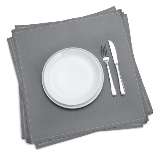Grey organic cotton dinner napkins with plate, fork, and knife, luxury table setting