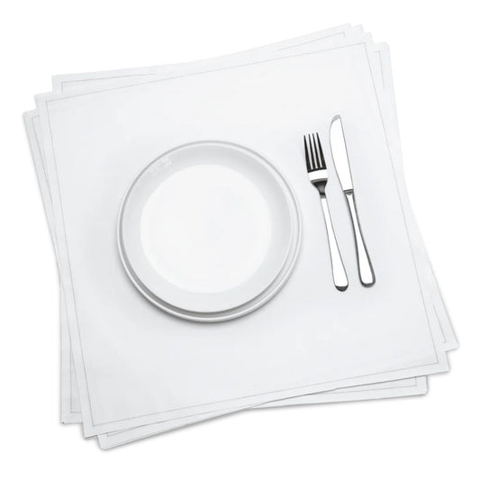 Stack of white premium organic cotton dinner napkins with a white plate, fork, and knife, by Five Star Napkins.