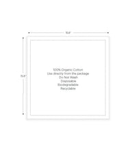 White organic cotton napkin, 15.8 x 15.8 inches, with usage and care instructions printed.