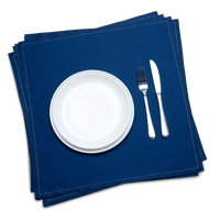 Midnight blue organic cotton dinner napkins with white plate and silverware, luxury table setting