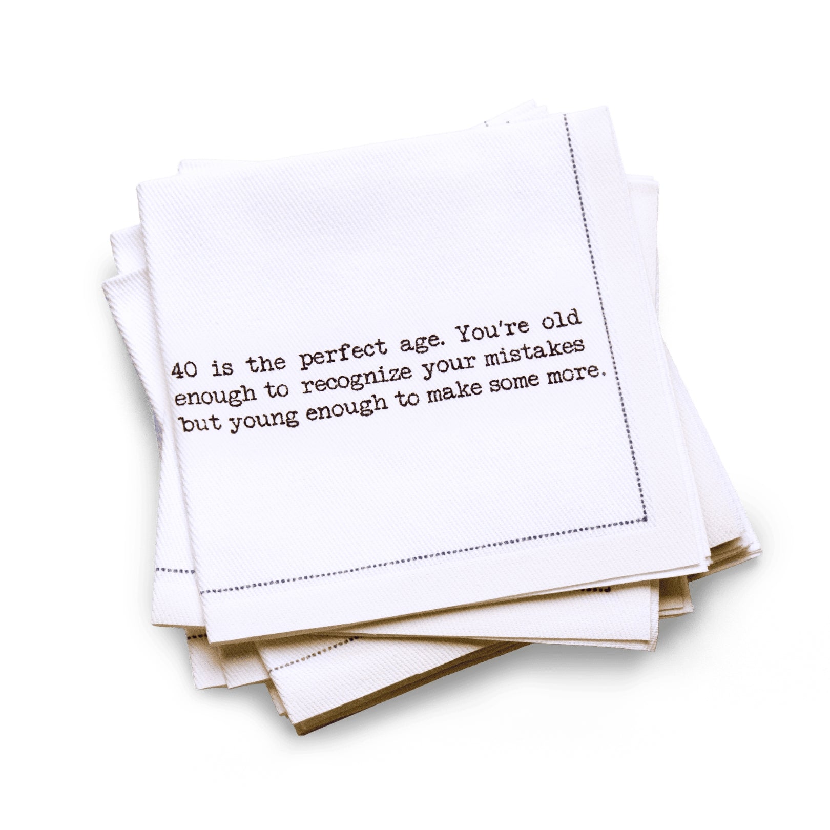 Organic cotton quarter-fold napkin with black dotted border printed with the quote "40 is the perfect age. You're old enough to recognize your mistakes but young enough to make some more," from Five Star Napkins' 40th birthday quote collection