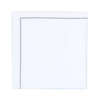White organic cotton napkin in quarter fold with stitched border detail