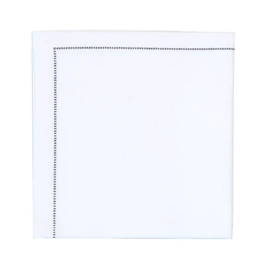 White organic cotton napkin in quarter fold with stitched border detail