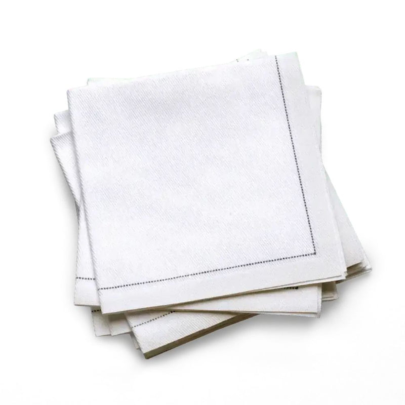 Stack of white organic cotton cocktail napkins in a quarter fold with a stitched border, by Five Star Napkins.
