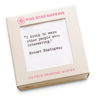 Kraft gift box from Five Star Napkins' Drinking Quotes First Edition collection, showing a quarter-fold organic cotton cocktail napkin printed with the quote "I drink to make other people more interesting"