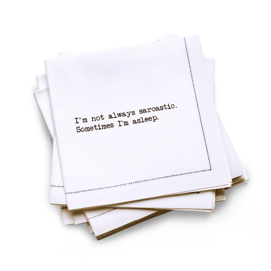 Quarter-fold organic cotton cocktail napkin with black dotted border printed with the quote "I'm not always sarcastic. Sometimes I'm asleep," from Five Star Napkins' Snarky quote collection