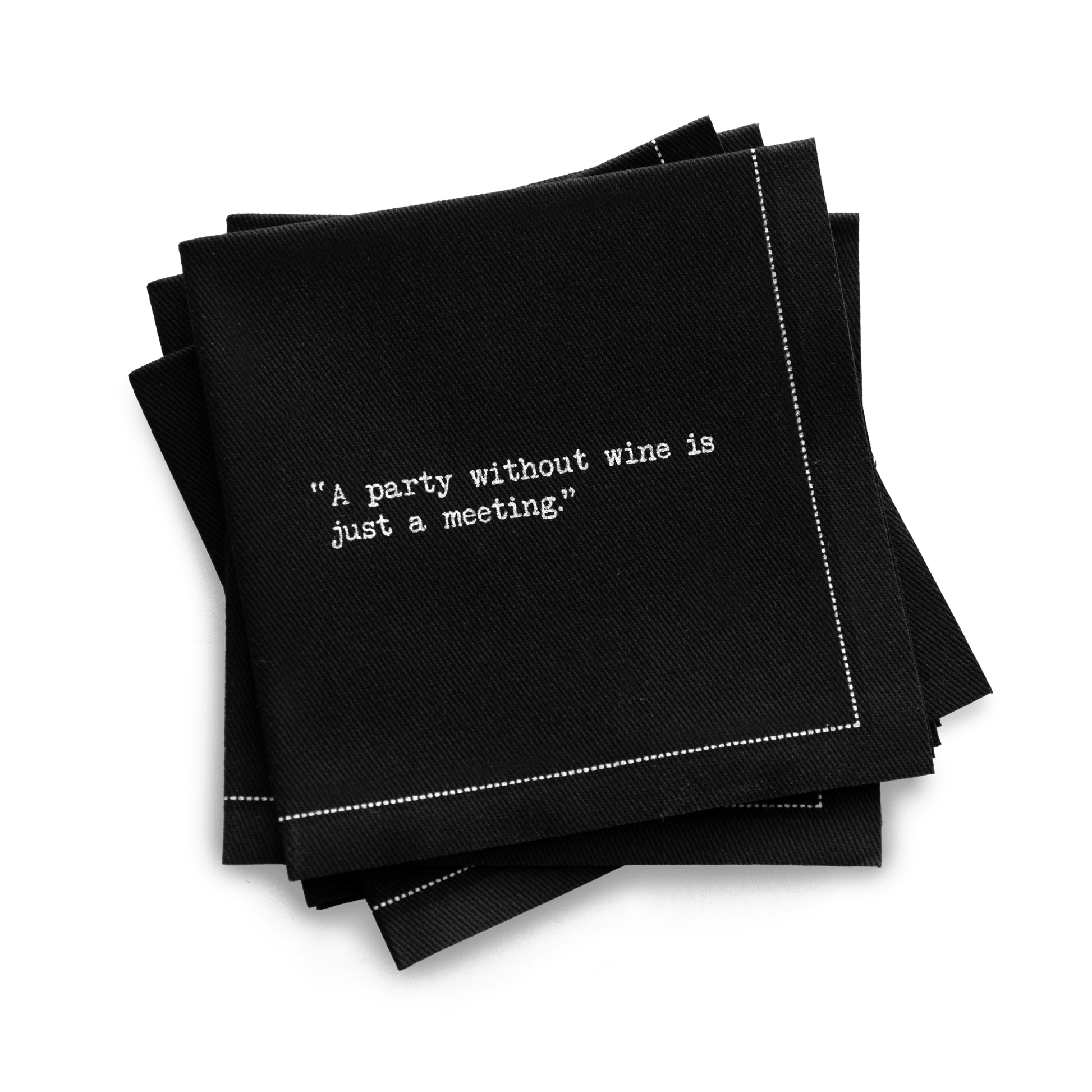 Quarter-fold organic cotton cocktail napkin, black, with white dotted border printed with the quote "A party without wine is just a meeting," from Five Star Napkins' Wine quote collection