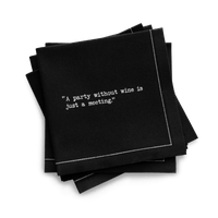 Quarter-fold organic cotton cocktail napkin, black, with white dotted border printed with the quote "A party without wine is just a meeting," from Five Star Napkins' Wine quote collection