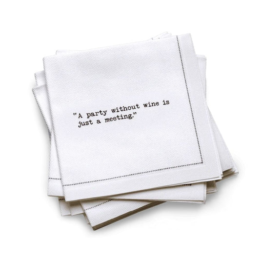 Quarter-fold organic cotton cocktail napkin, white, with black dotted border printed with the quote "A party without wine is just a meeting," from Five Star Napkins' Wine quote collection