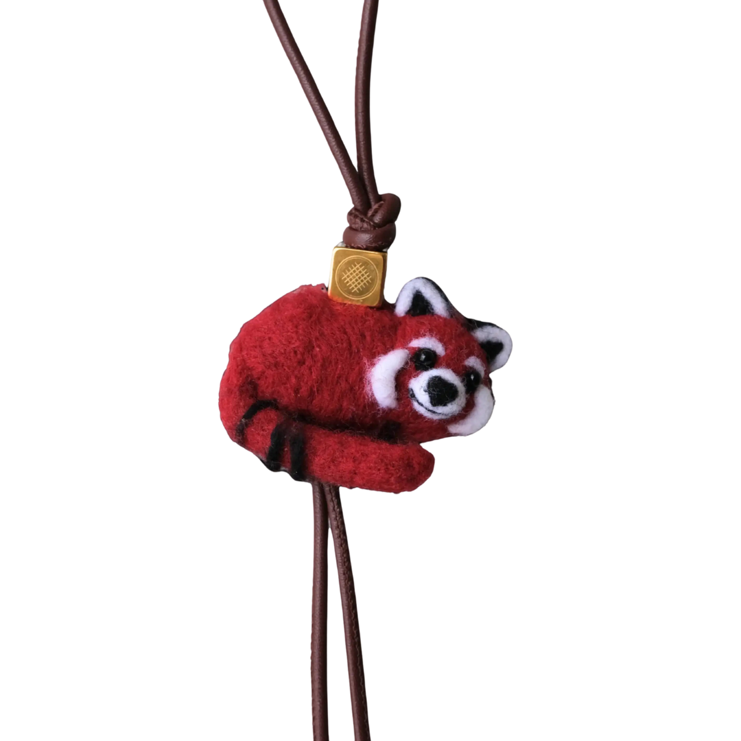 Felt red panda charm on brown cord, with gold accent, cute animal accessory