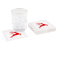 Stack of organic cotton cocktail napkins with red reindeer design beside a glass of ice