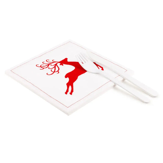 organic cotton napkin with red reindeer design, flat lay with white cutlery