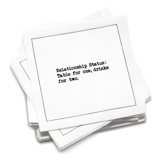 Organic cotton cocktail napkin stack printed with the quote “Relationship Status: Table for one, drinks for two,” from Five Star Napkins’ Relationship quote collection.
