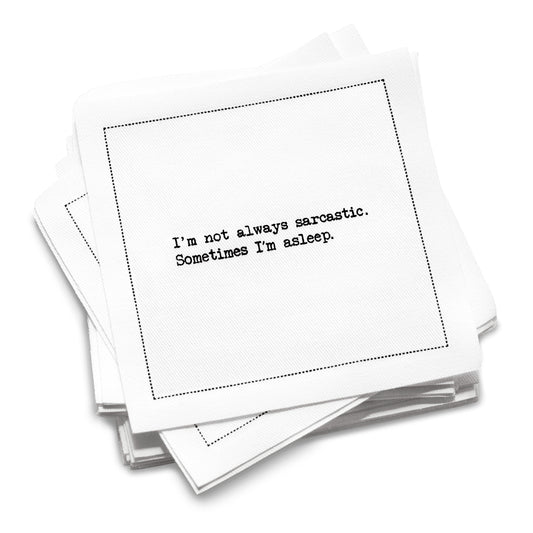 Organic cotton cocktail napkin with black dotted border printed with the quote "I'm not always sarcastic. Sometimes I'm asleep," from Five Star Napkins' Snarky quote collection