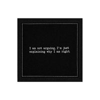 Organic cotton cocktail napkin, black, with white dotted border printed with the quote "I am not arguing, I'm just explaining why I am right," from Five Star Napkins' Snarky quote collection