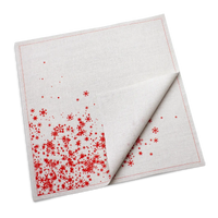 Folded natural organic cotton dinner napkin with a red snowflake print, by Five Star Napkins.
