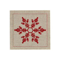 Organic cotton cocktail napkin with red Toreador snowflake embroidery on natural fabric.