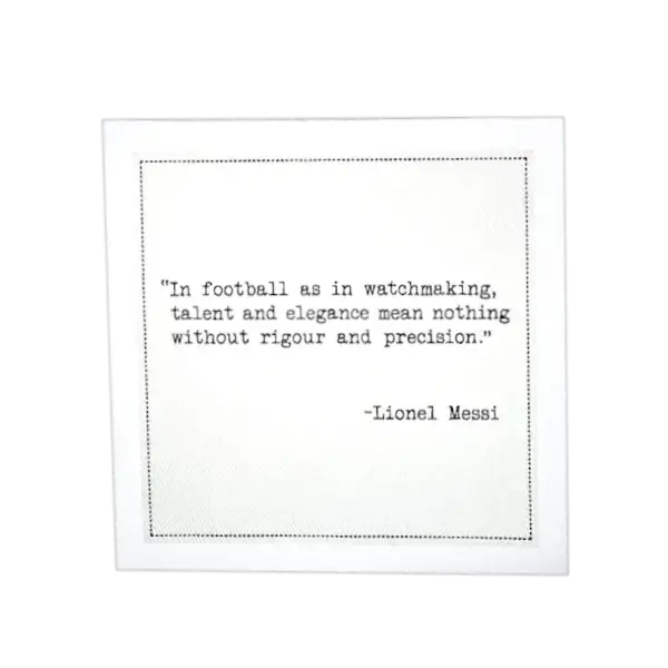 Organic cotton cocktail napkin printed with the quote “In football as in watchmaking, talent and elegance mean nothing without rigour and precision,” – Lionel Messi, from Five Star Napkins’ Soccer Legends quote collection.