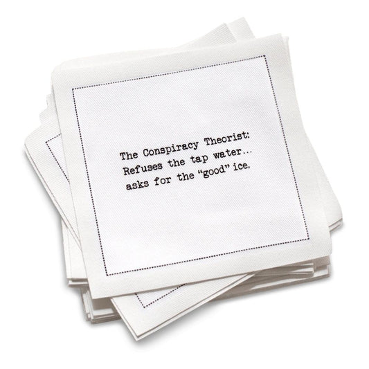 Stack of white organic cotton napkins with a stereotype quote on it 
