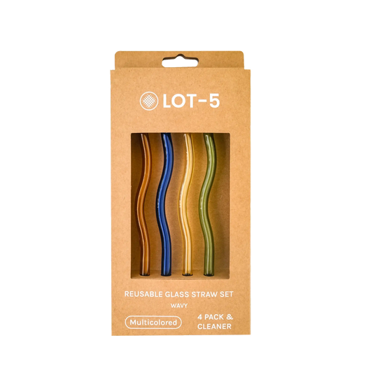 Set of four multicolored wavy glass straws in kraft box, gold, blue, clear, green.