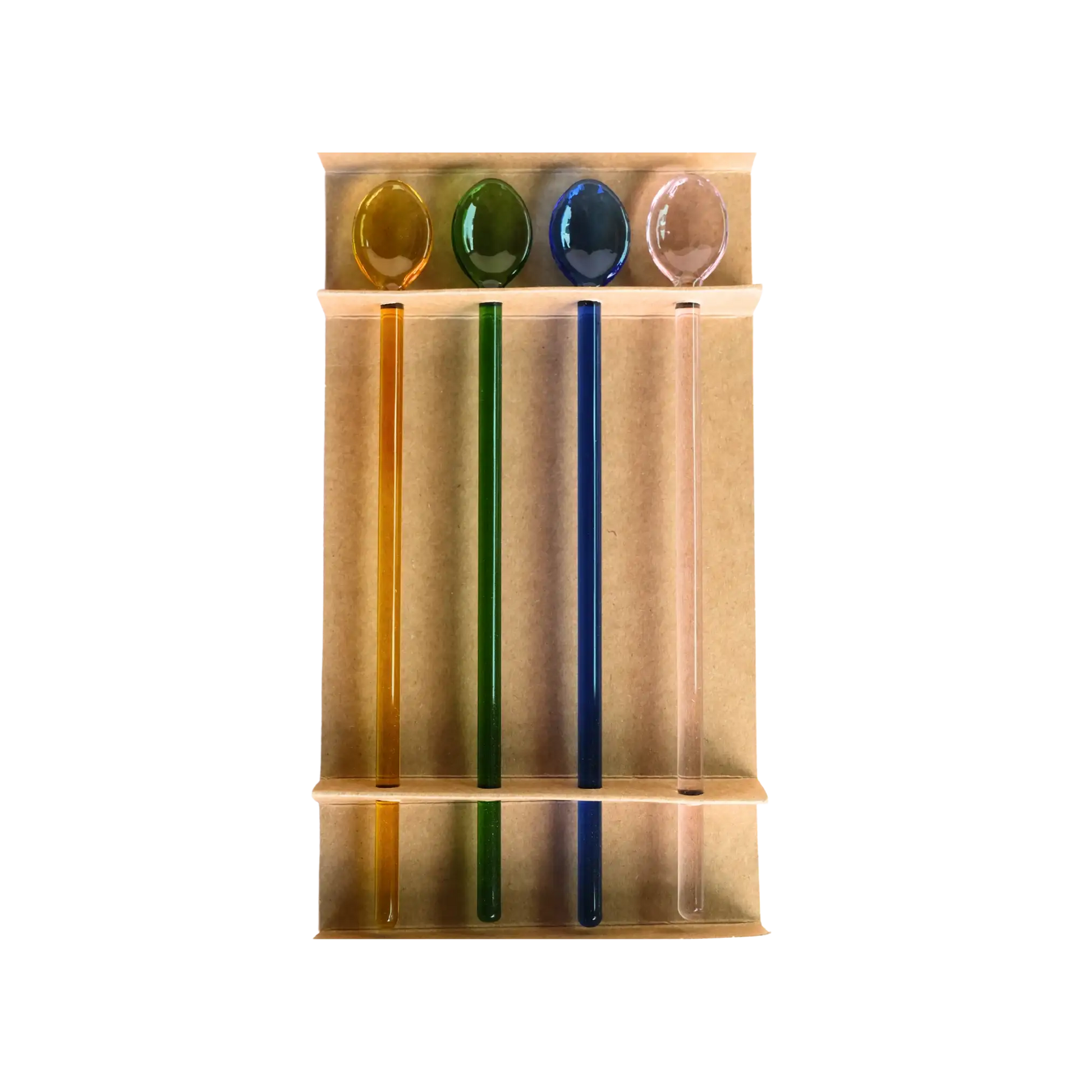 Four glass cocktail swizzle spoons in yellow, green, blue, and pink displayed in their kraft packaging tray.