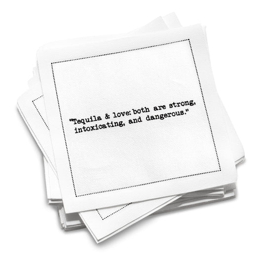 Organic cotton cocktail napkin with black dotted border printed with the quote "Tequila & love: both are strong, intoxicating, and dangerous," from Five Star Napkins' Tequila quote collection