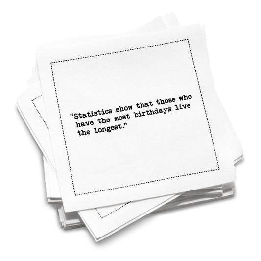 Organic cotton cocktail napkin stack printed with the quote “Statistics show that those who have the most birthdays live the longest,” from Five Star Napkins’ Universal Birthday quote collection.