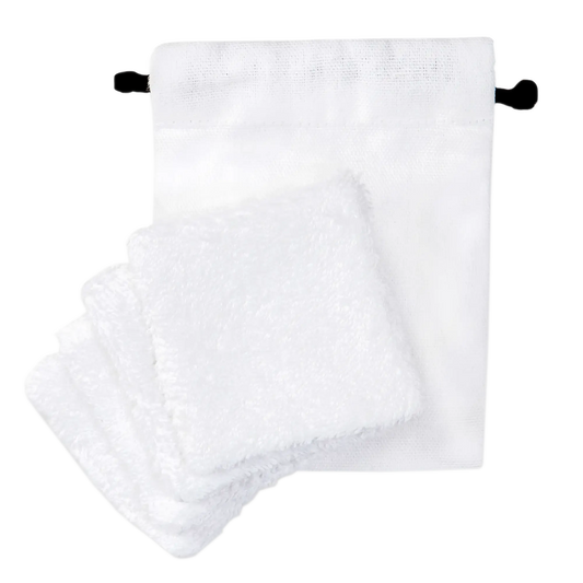 Set of four white organic cotton pads with a matching drawstring pouch