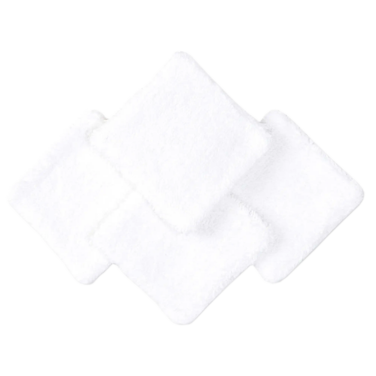 Four white organic cotton square pads with visible soft texture, stacked diagonally