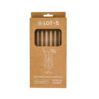 Box of transparent reusable glass straws, six-pack with cleaner, visible through window