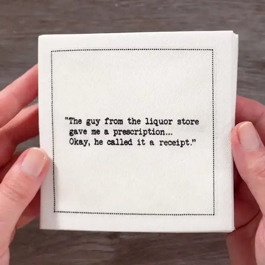 Video close-up of an organic cotton cocktail napkin printed with the quote “The guy from the liquor store gave me a prescription… Okay, he called it a receipt,” from Five Star Napkins’ Whiskey quote collection.