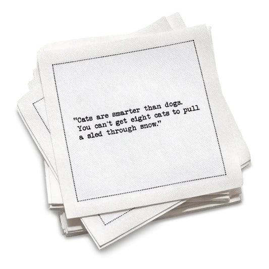 Stack of white cocktail cotton napkins with black text about cat quotes on a white background