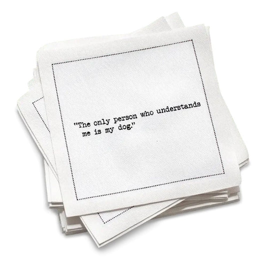 Stack of white cotton cocktail napkins with black Dog Quote - Five Star Napkins on a white background