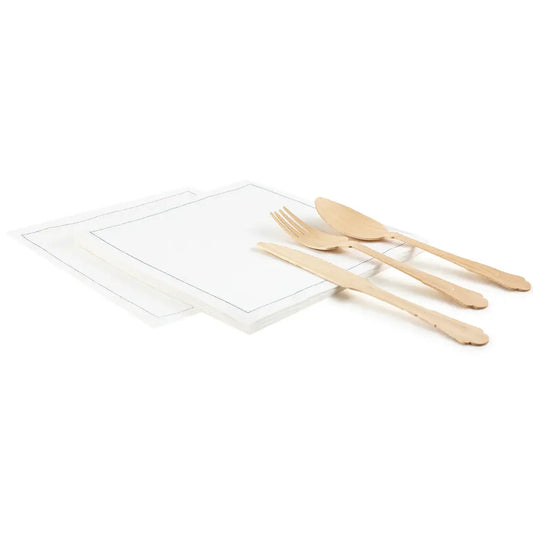 Two folded Linen White organic cotton napkins with wooden cutlery on white background